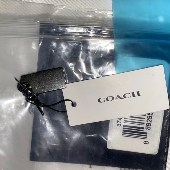 Sterling Silver Signature Hangtag Single Huggie Earring - Picture 8 of 11